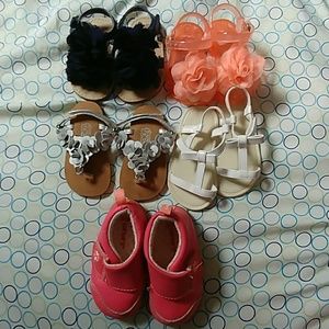 5 pairs of baby girl shoes.